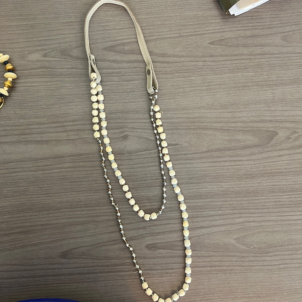 Noonday necklace with silver and ivory beads. necklace extender.